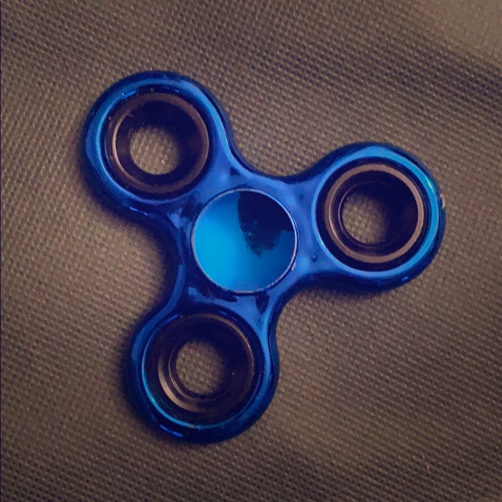 Used blue Fidget spinner
